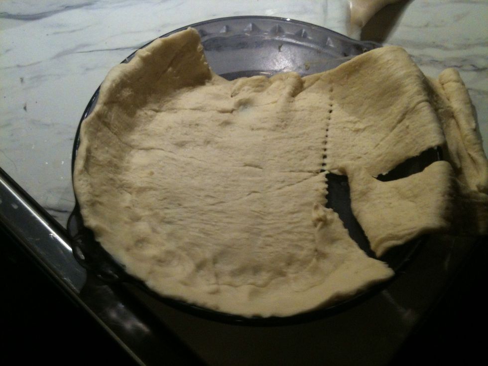 Line a pie plate with the Pillsbury Crescent Rolls. If you don't like these you can use a ready made pie crust.