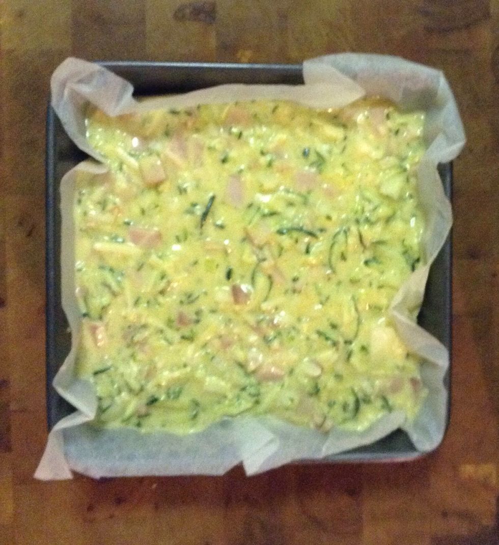 Line a shallow baking tin (such as a lamington tin) with baking paper and pour mixture in.