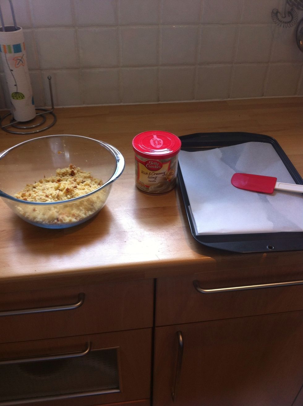 Line a tray with grease proof paper and get out your icing.