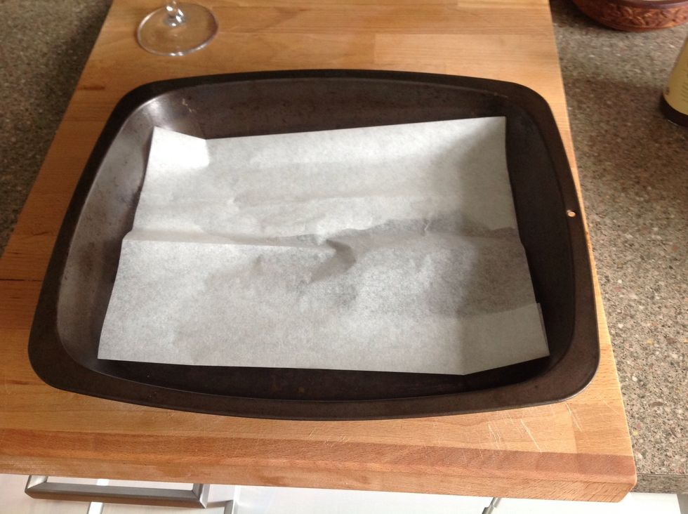Line a tray with grease proof paper