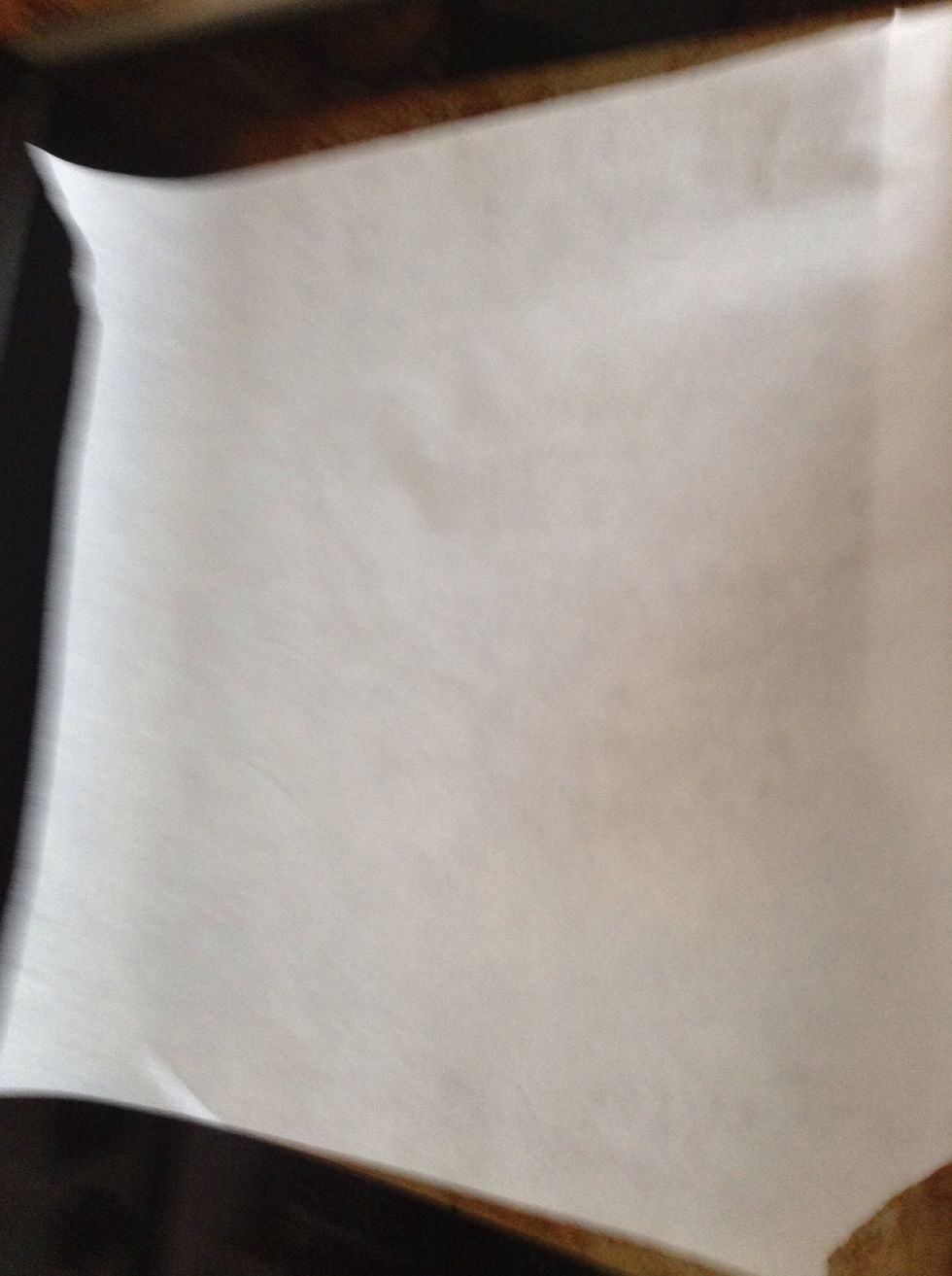 Line a tray with parchment paper (sorry for the blurry picture)
