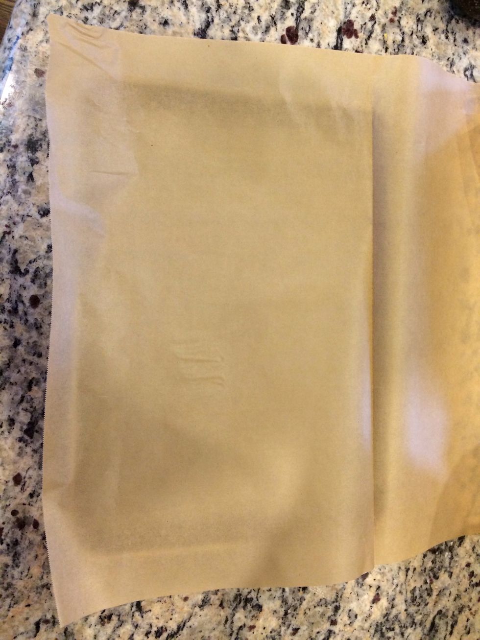 Line a tray with parchment paper