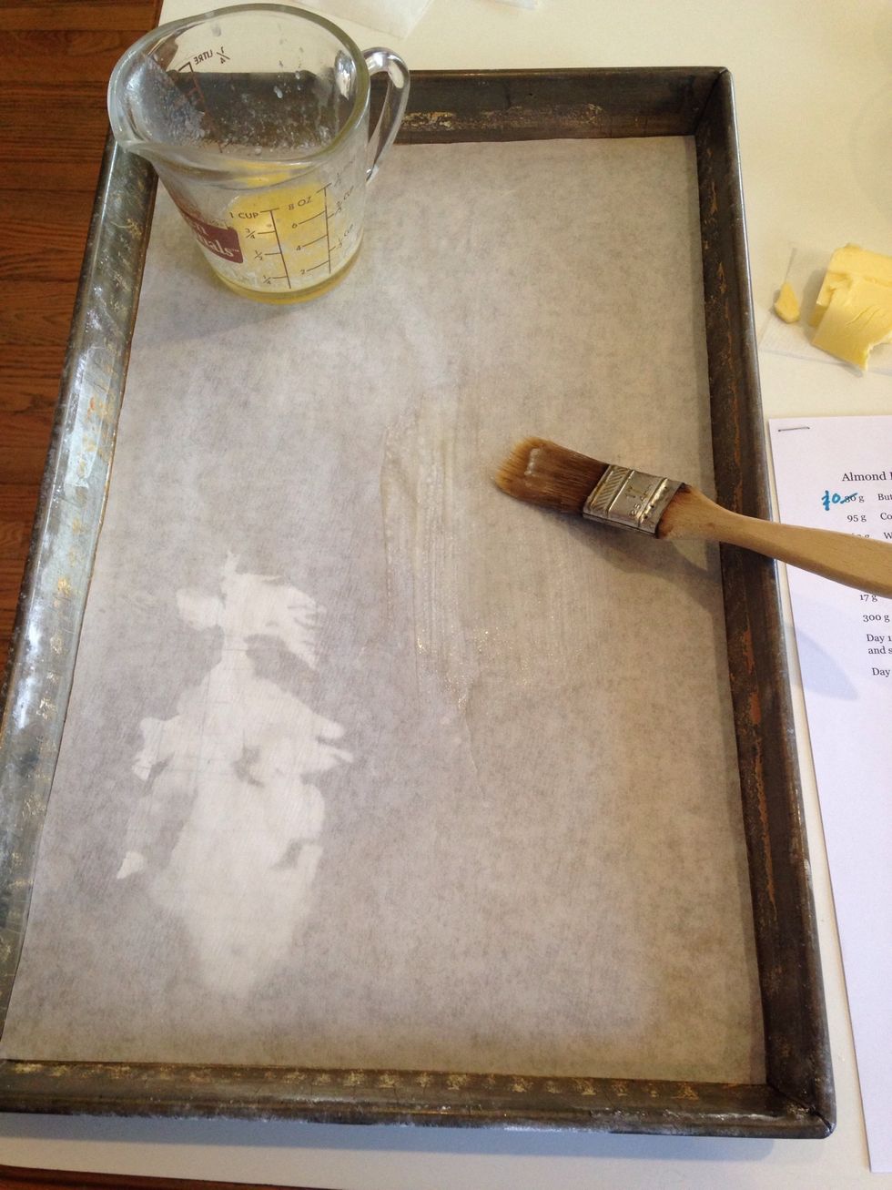 Line an 11x17 sheet pan with parchment and brush with melted butter. Preheat the oven to 400* with rack positioned in the middle.