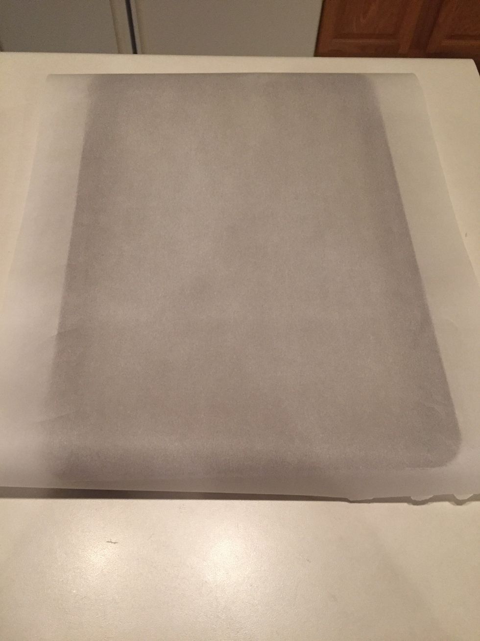 Line baking pan with parchment paper.