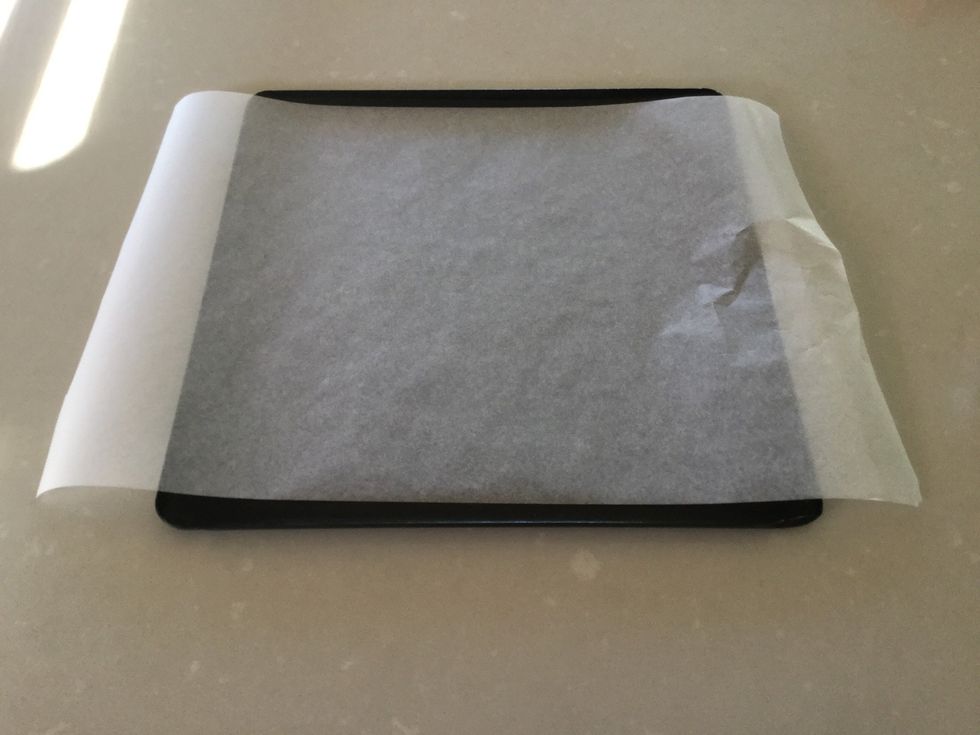 Line baking tray with baking paper