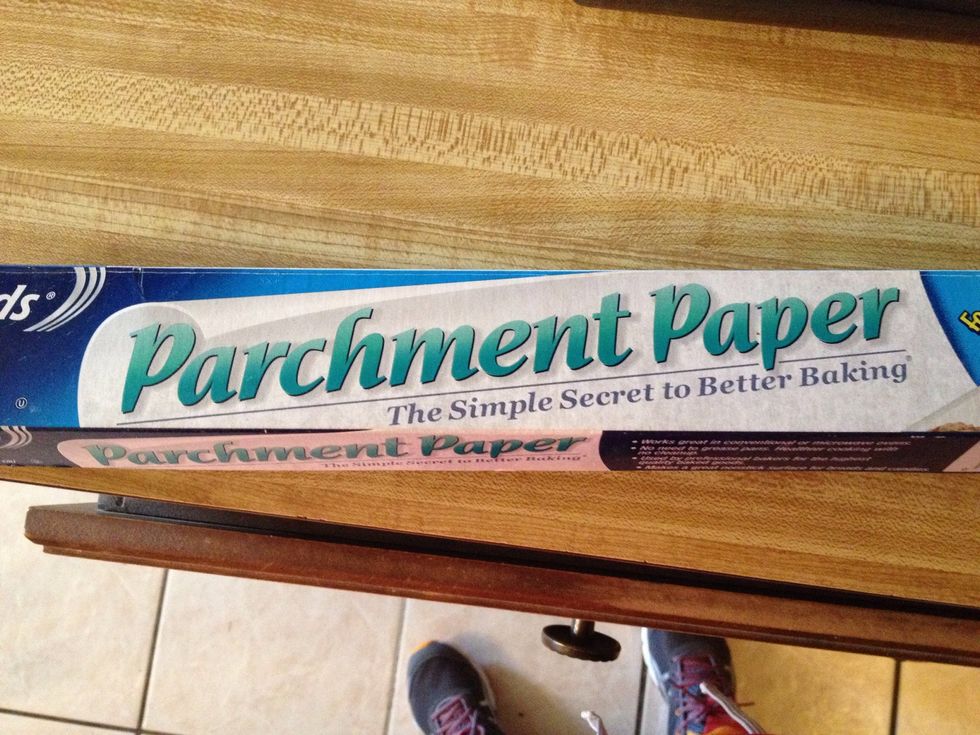 Line cookie sheet with parchment paper