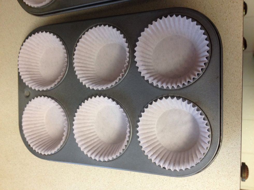 Line cupcake tins with paper