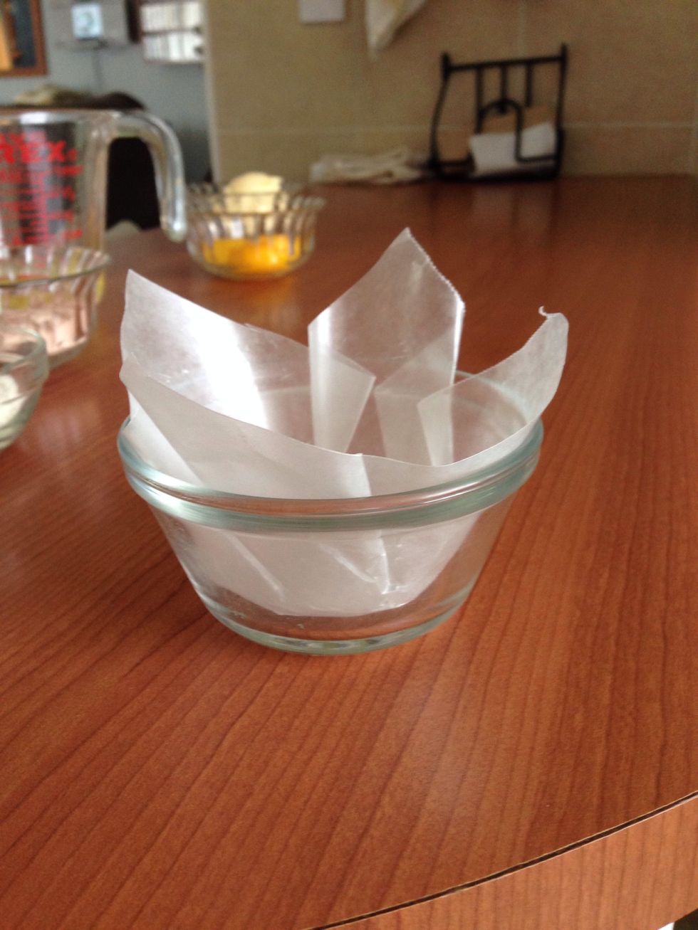 Line the baking cups with wax paper