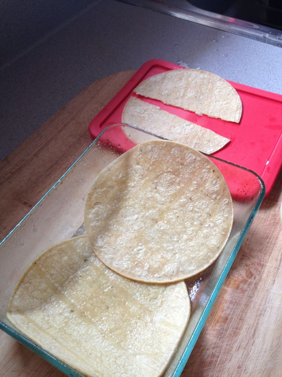 Line the bottoms of the dish with however many fit. I had a small dish and only three tortillas left