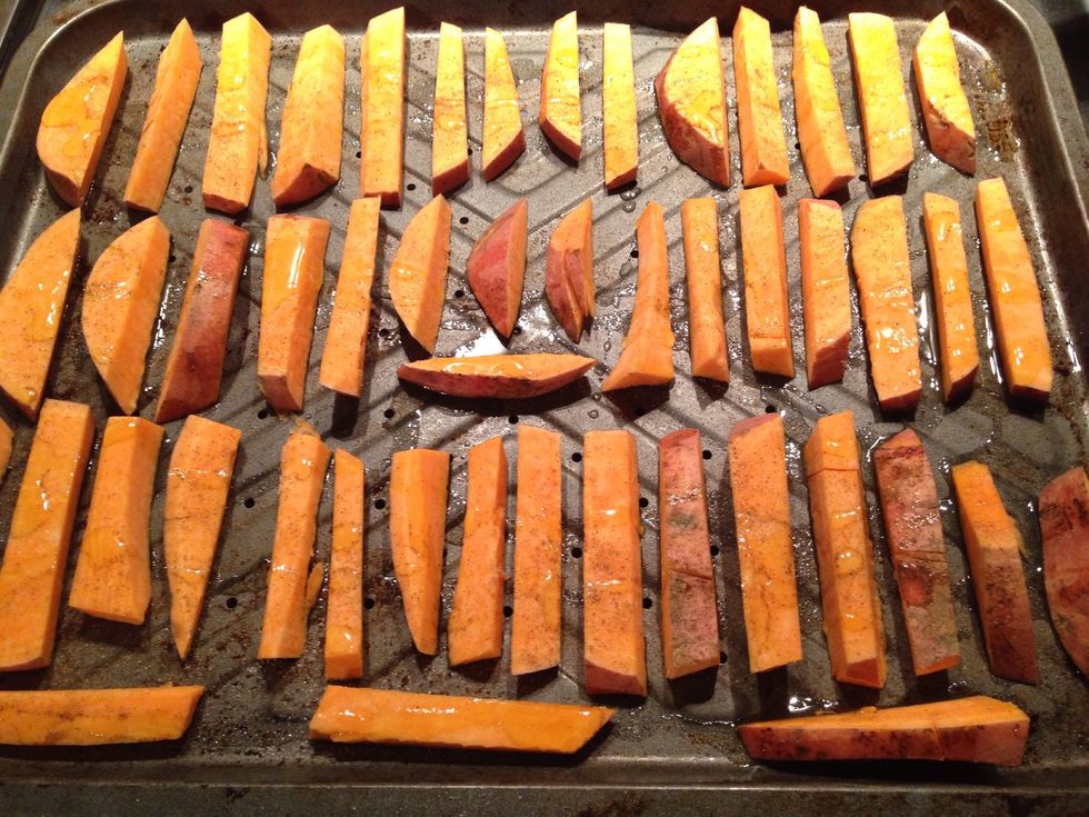 Line the fries up on the baking tray. Drizzle over the remaining ingredients.