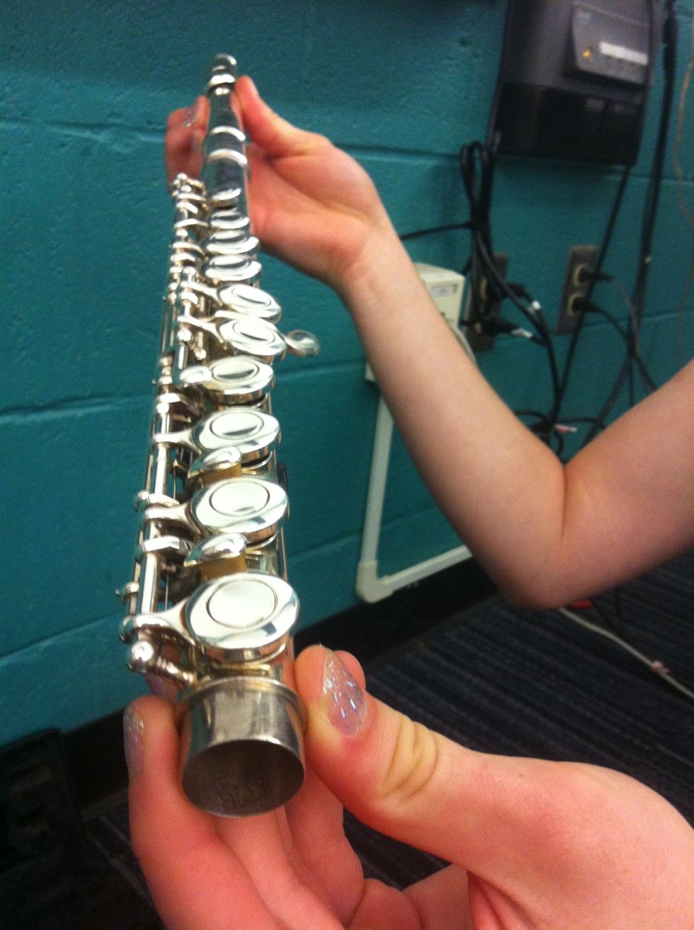 Line the keys up with the head joint holding it out at eye level, as shown above, is helpful. The mouthpiece is the farthest away (click on picture for better view)