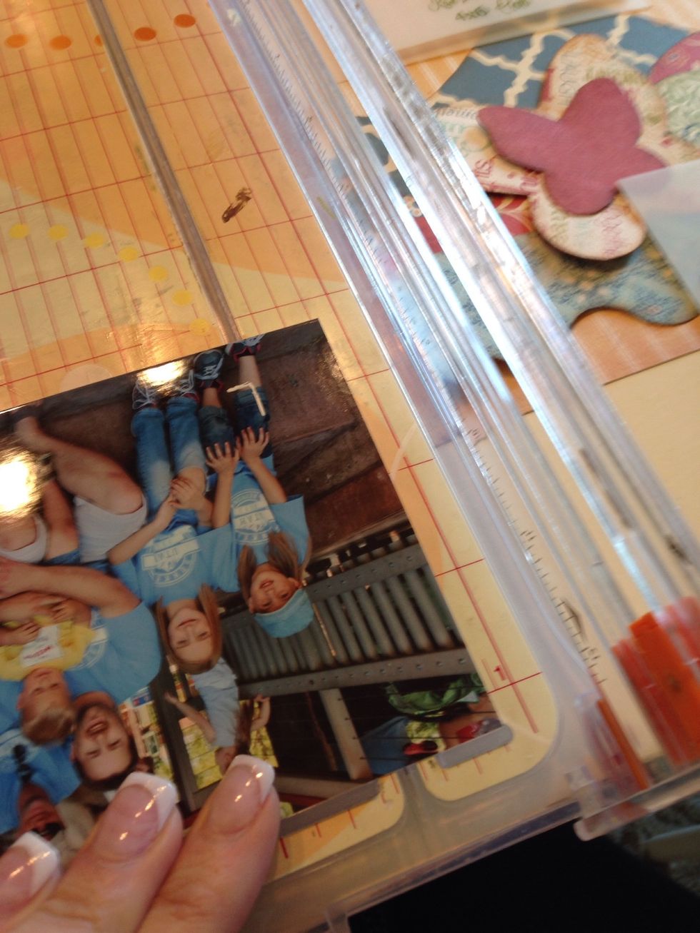 Line the marks up with your paper trimmer and trim down your picture to the exact size you need.