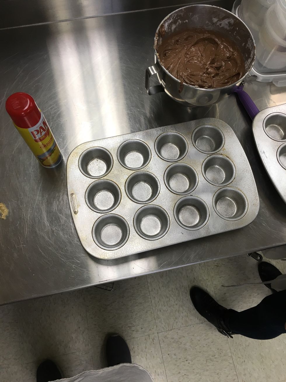 Line the muffin pan with cupcake liners. (liners not shown)