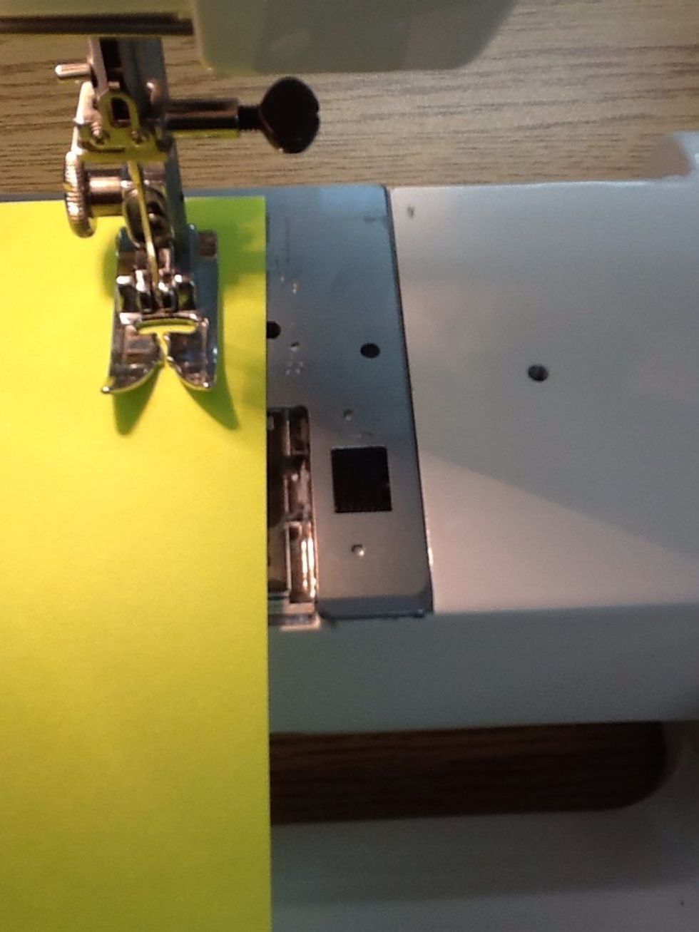 Line the right edge of the paper up to the 5/8 mark