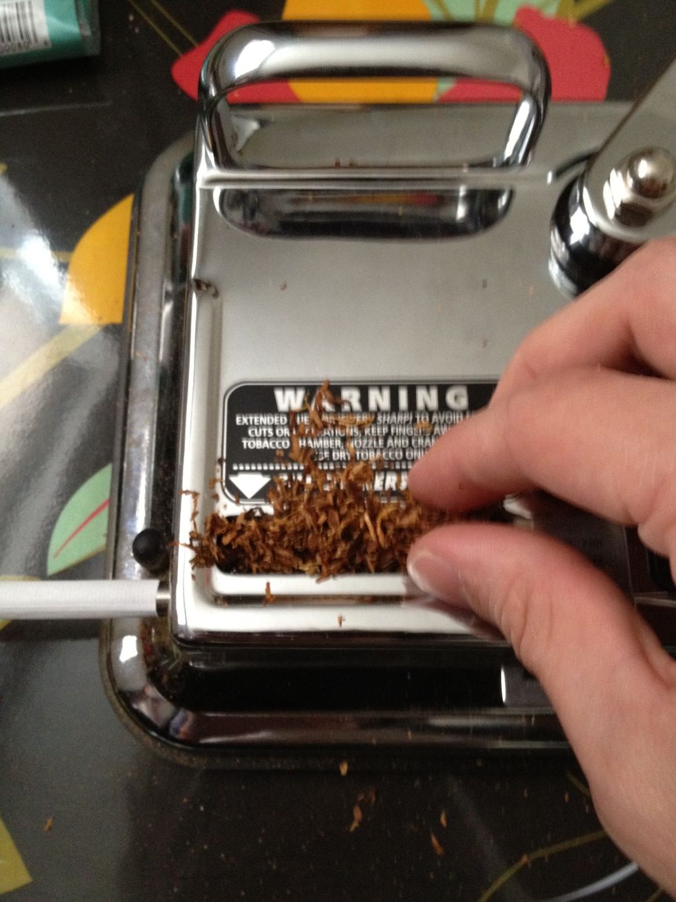 Line the tobacco along the chamber, this makes it easier to pack in.