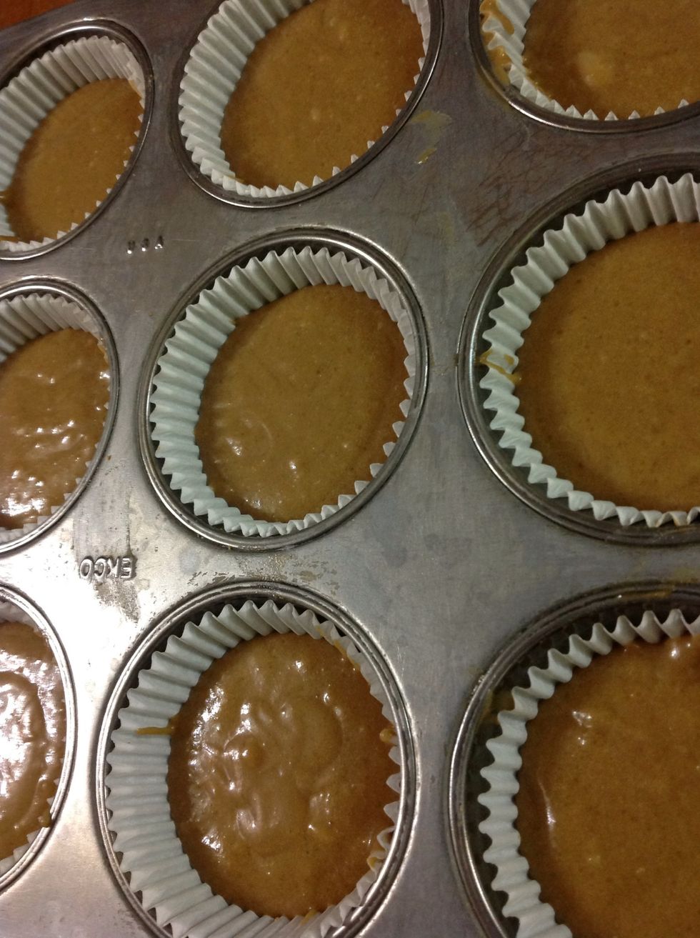 Line the tray with baking paper, and add the mix, as you can see its not stiff and runs easily. You can tell this because it wont hold a shape for long time, it will stick to the tray's shape.