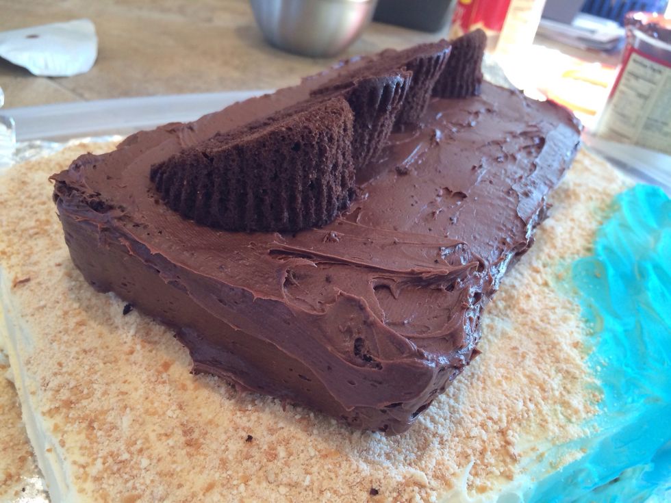 Line them up along the back edge. This will prop open & support the treasure chest lid.