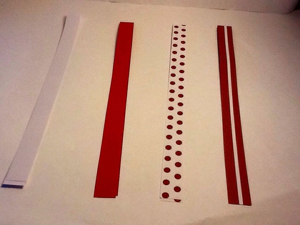 Line up 4 strips for one star if you are a beginner use white paper I am using 4 different to illustrate how to do it