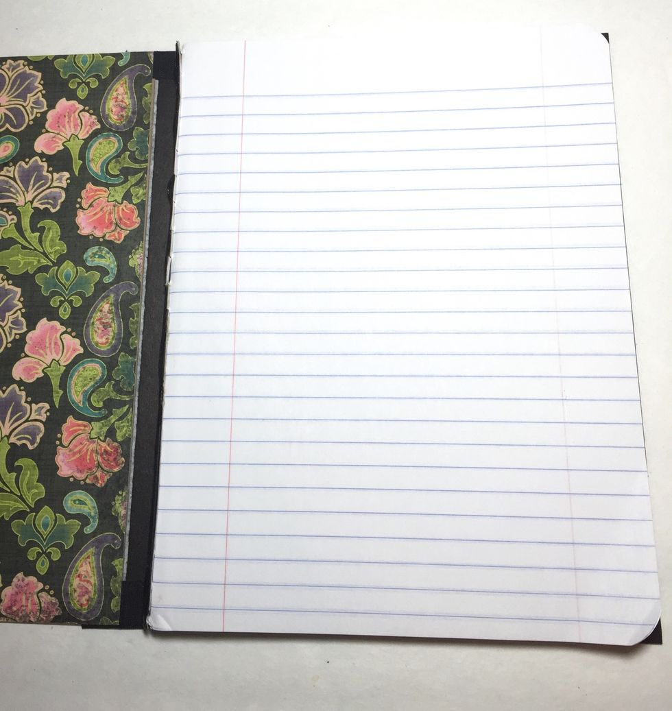 line up and lay pages inside your cover, once happy with placement, close the cover.