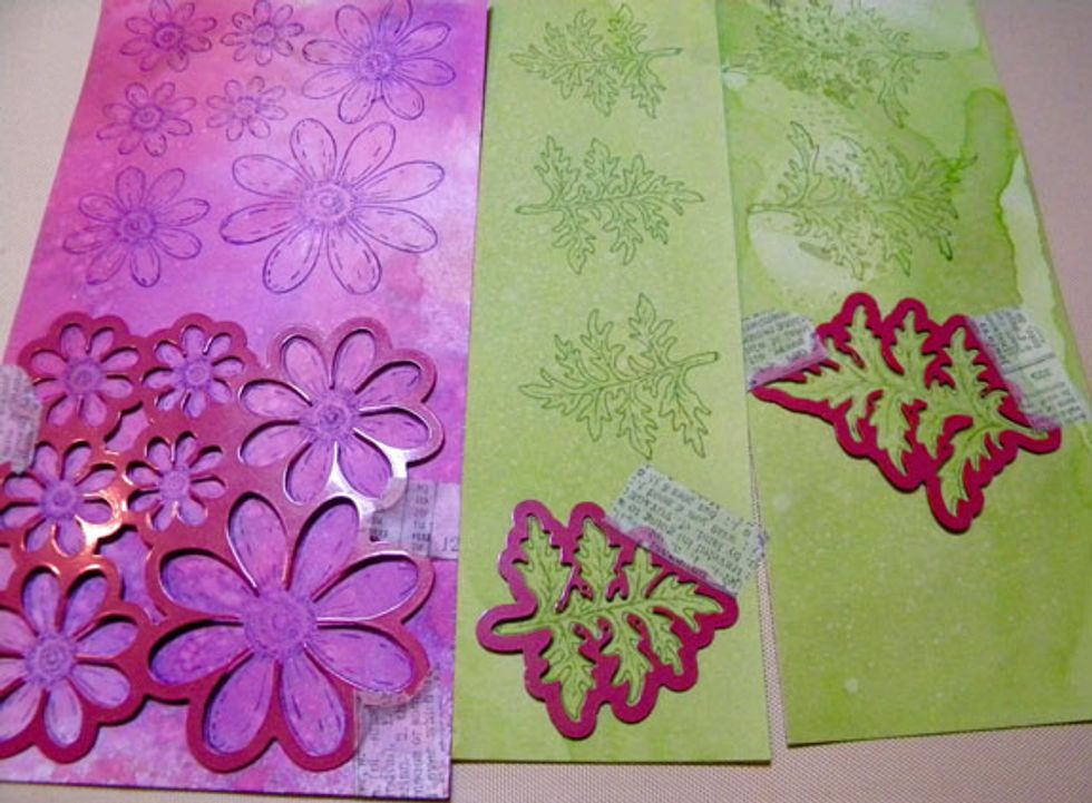 Line up the dies onto the stamped images and add a bit of washi tape to hold them in place. Use your die cut machine to cut them out.