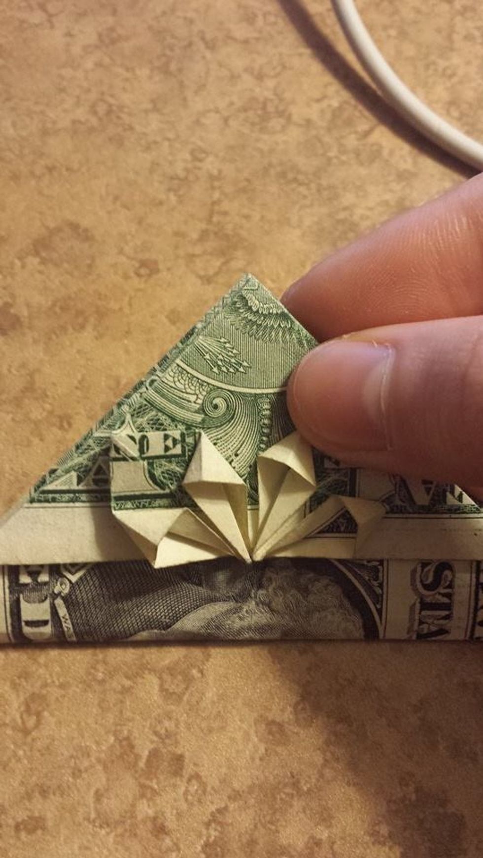 Line up the ends and fold it.