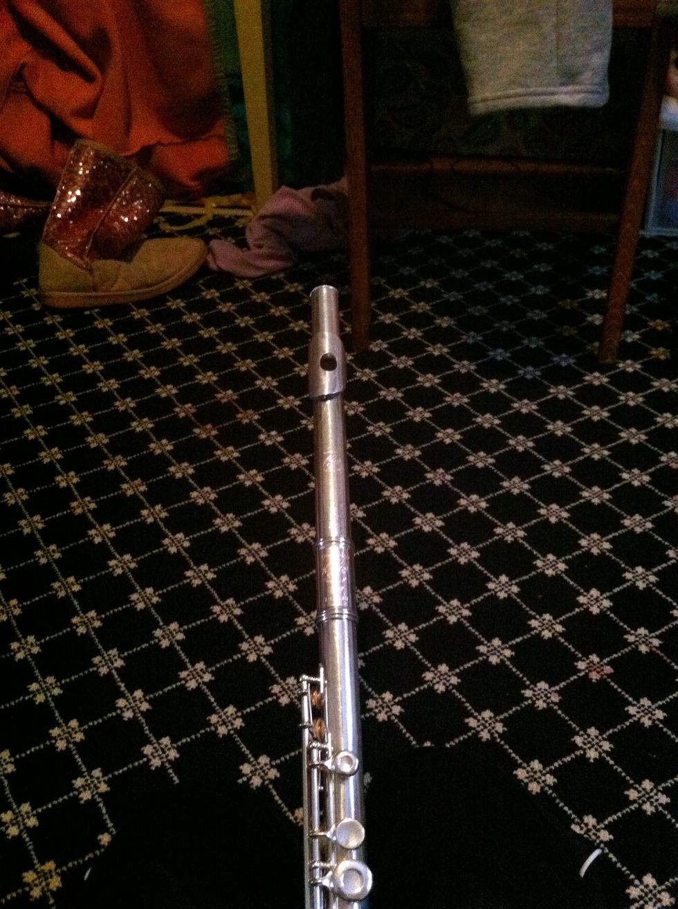 Line up the hole on the mouth piece with the keys