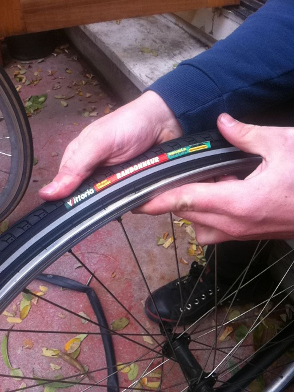 line up the logo on the tire with the hole