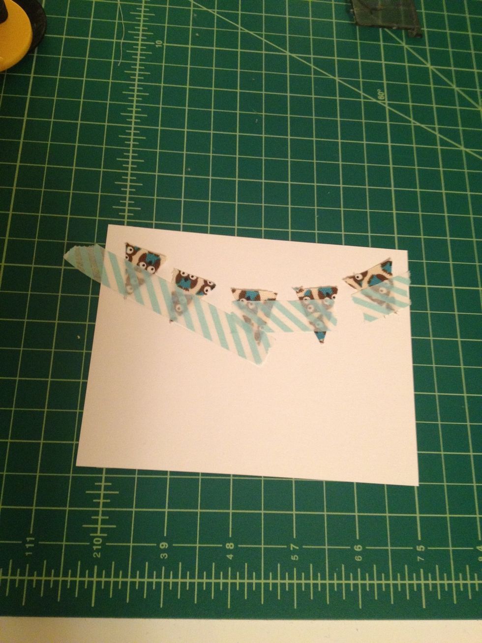 Line up the triangles like a banner. Tape in place with masking or washi tape.