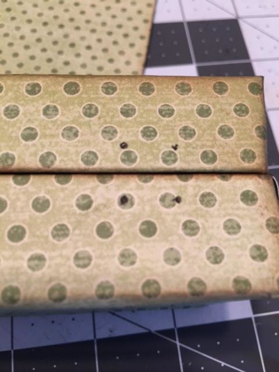 Line up the two boxes together, use a pen or pencil to mark the holes of your hinges.