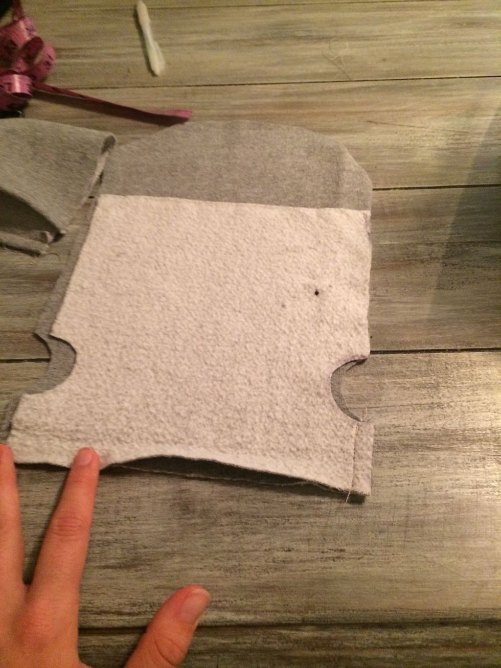 Line up top and bottom, right sides together. (They're different sizes so the won't line up perfectly) Stitch both side together, leaving room near arms.