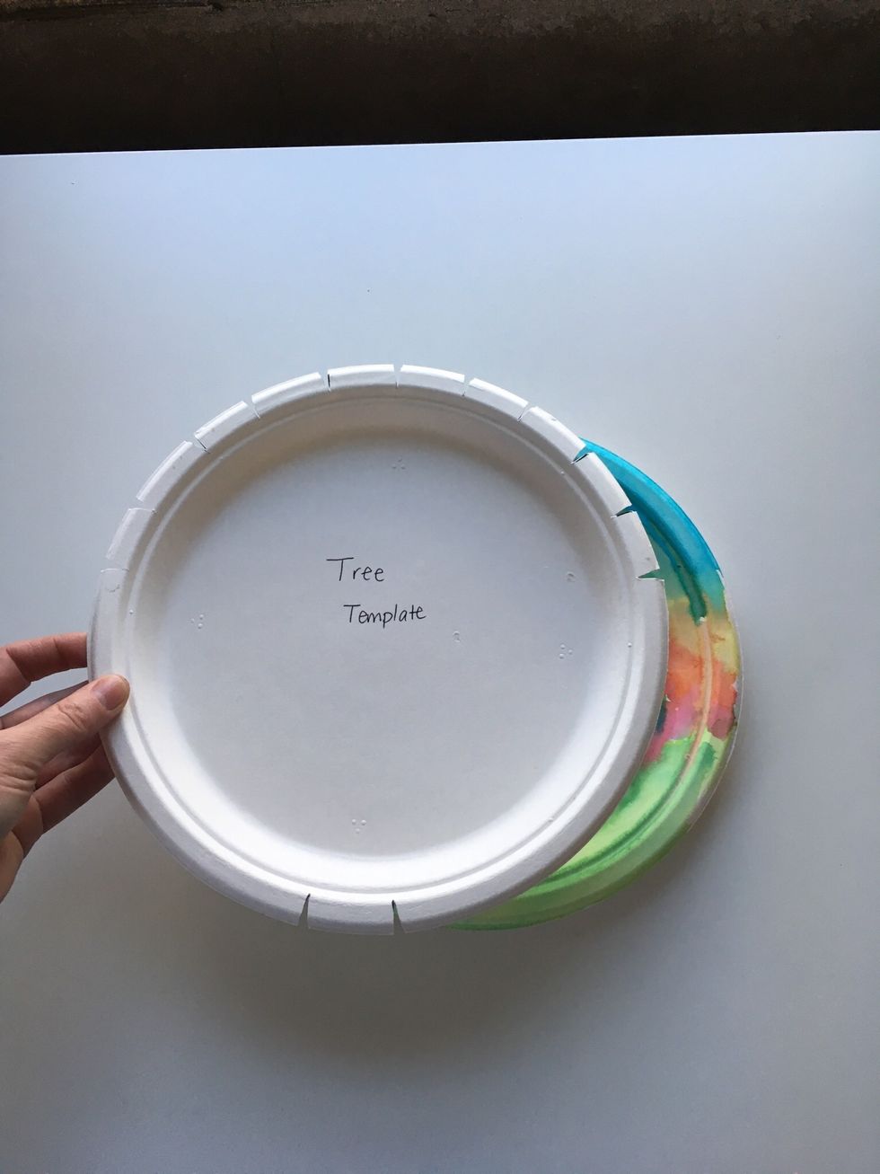 Line up your tree template so that the two bottom marks are at the bottom of your painted plate.