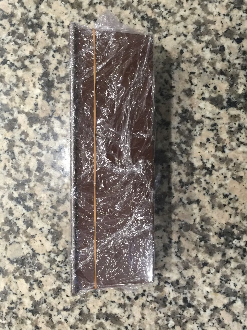 Line with plastic wrap and secure it with a rubber band. Easier to handle while filling