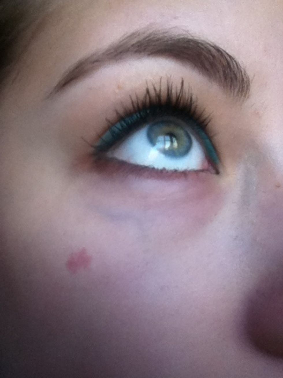 Line your bottom lids with the brown, making the line thicker towards the outer corner of your eyes.