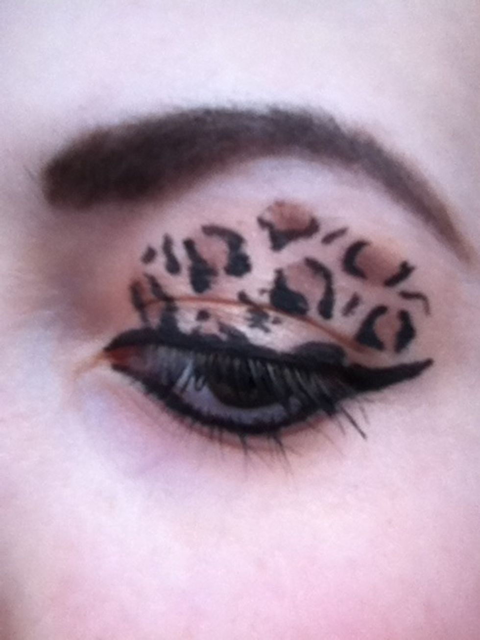 Line your eyebrows with the right colour and line your bottom lash line with the black eyeliner so it joins up to the curve.