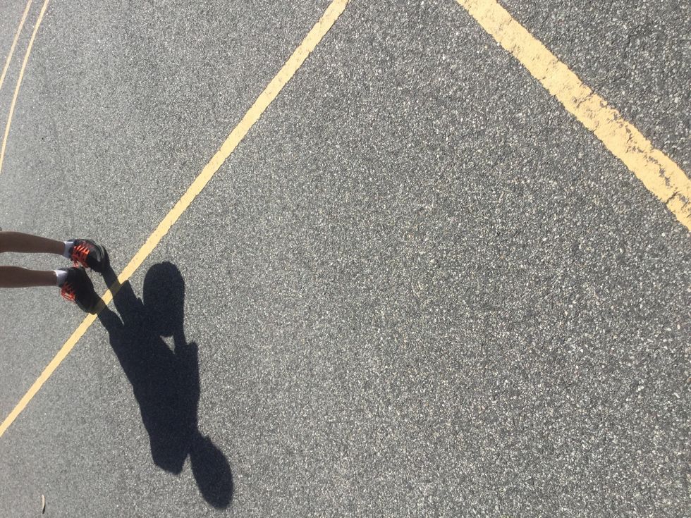 Line your feet with the hoop, with your dominate foot forward.