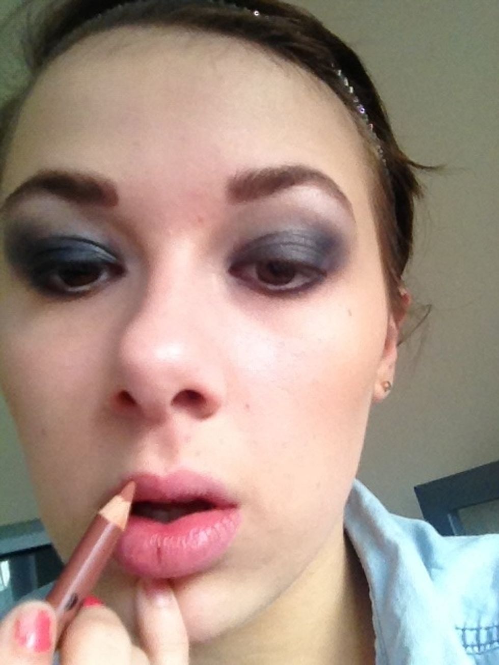 Line your lips with a nude lip liner, I'm using mooch by cargo