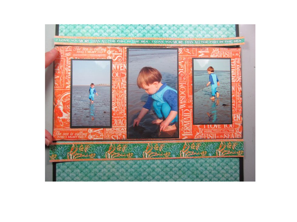 Line your photo center with two strips of decorative boarders from the Graphic 45 collection. I used a fine strip and then a broader one to give it more interest.