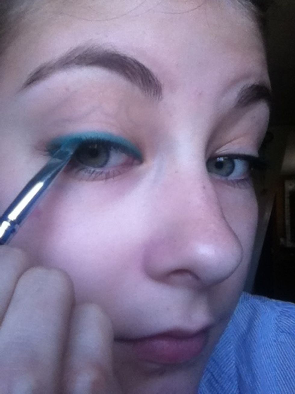 Line your top lids with the blue :)
