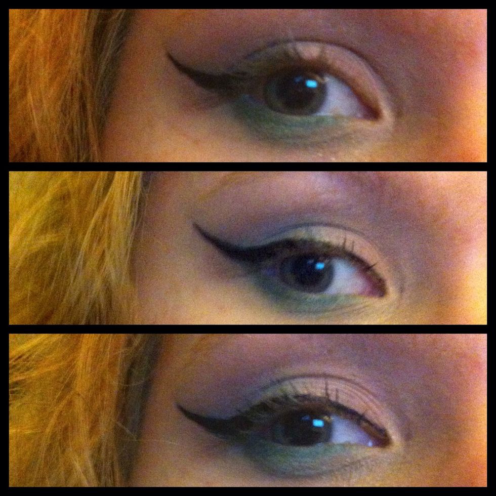 Liner time! Create winged tip first by lining along the clean shadow's edge, taper the liner to a point. Then from its thickest point @ the eye's edge, to the inner corner of the eye, tapering also.