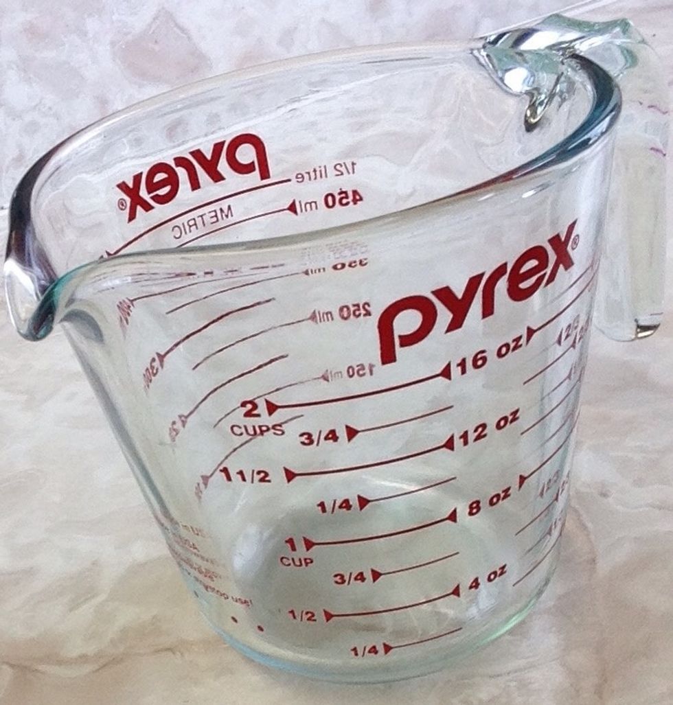 Liquid measuring cup. Used for measuring liquids. I can use this when measuring milk for a shake.