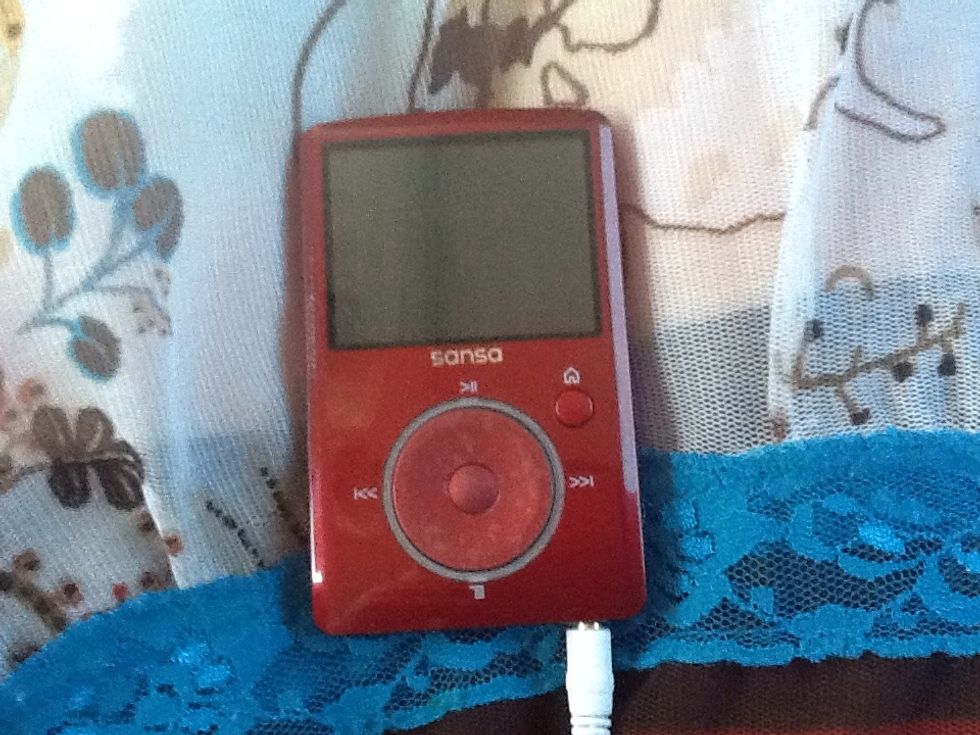 Listen to music or audio books on a iPod or a radio. You could also borrow audiobooks from the library. audiobooks are a great choice if you like to read but reading in the car gives you a headache.