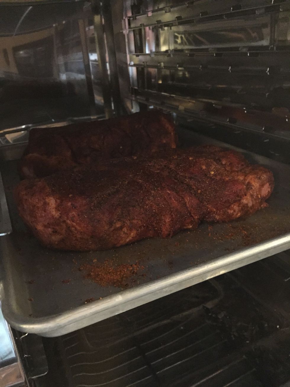 Load the pork into the oven.