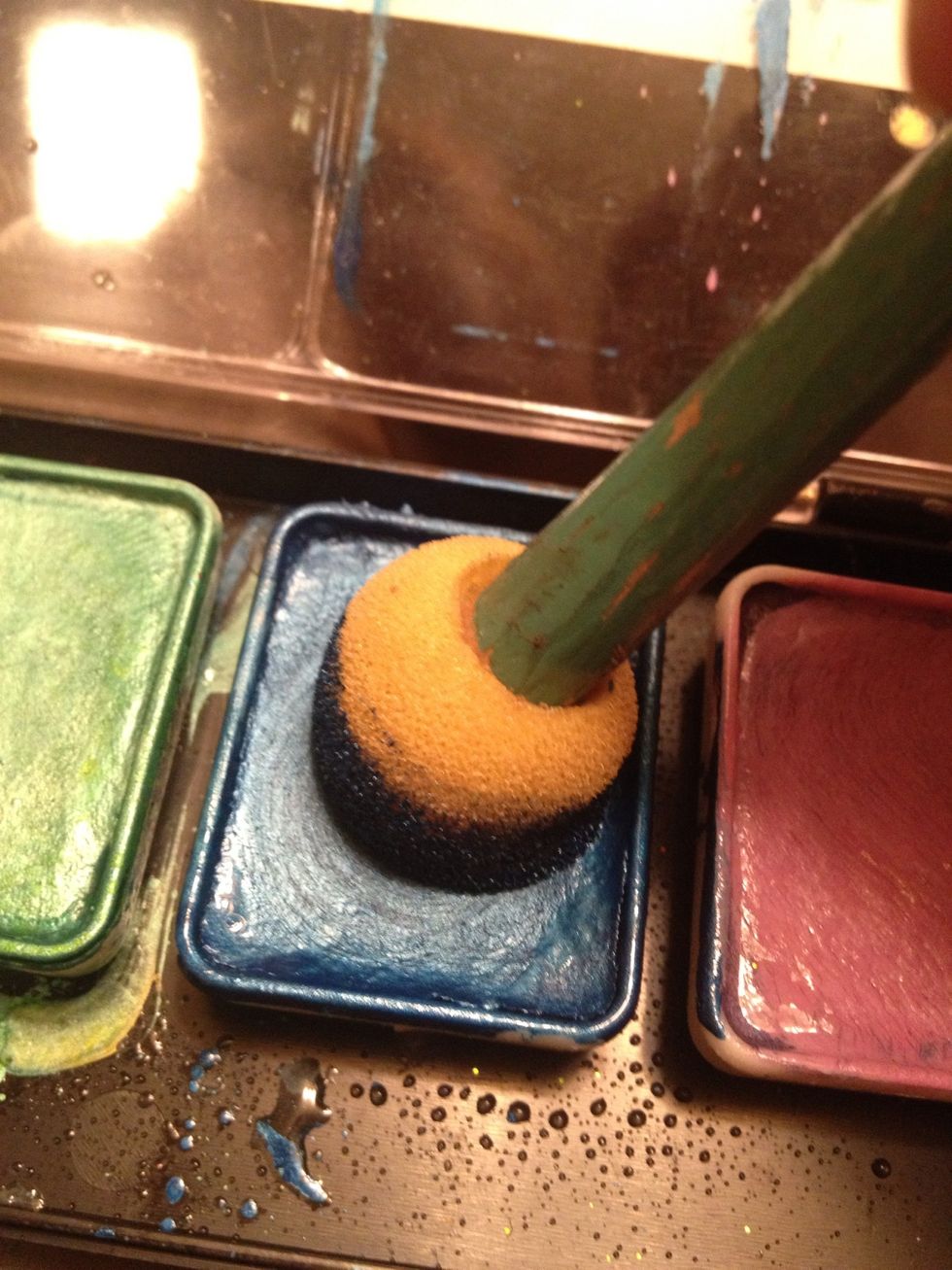 Load up a sponge with metallix blue.