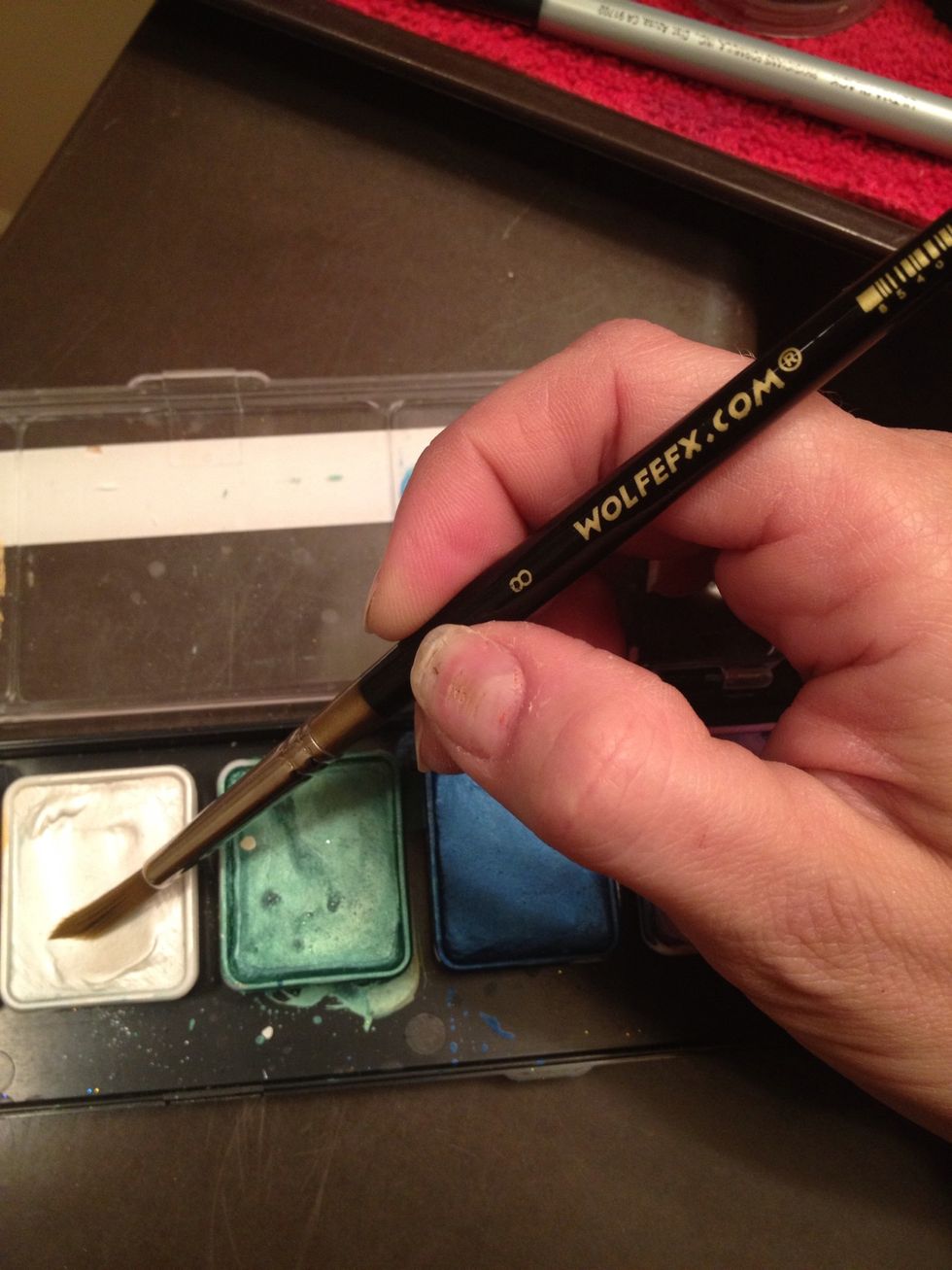 Load up your brush with Wolfe Metallix white.