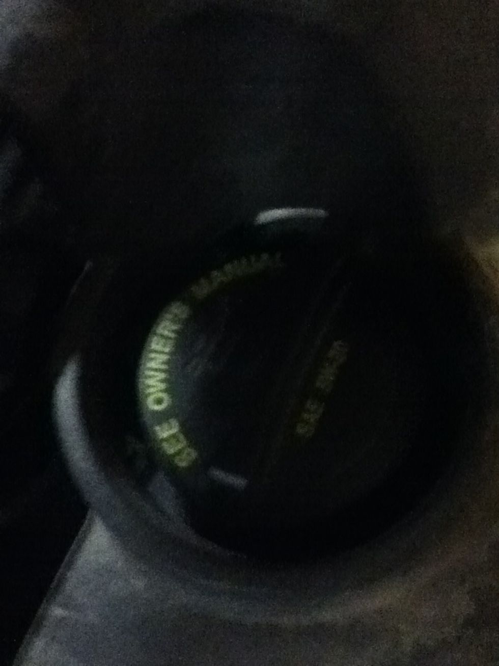 locate oil cap and remove it