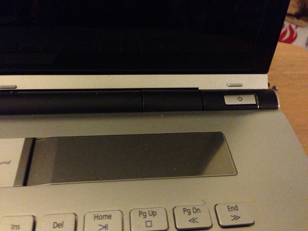 Locate the power button and turn your computer on.