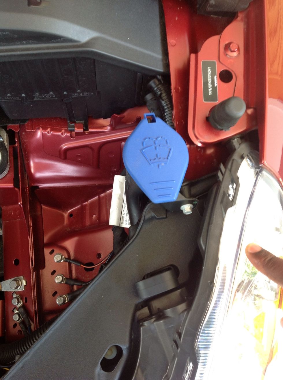 Locate washer fluid reservoir