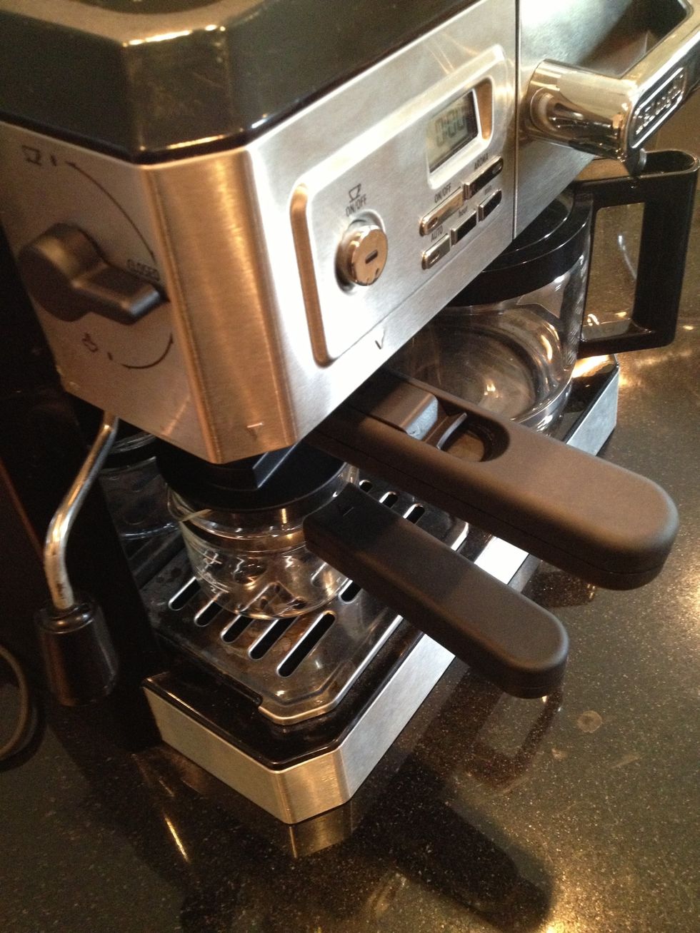 Lock in place and put glass cup underneath