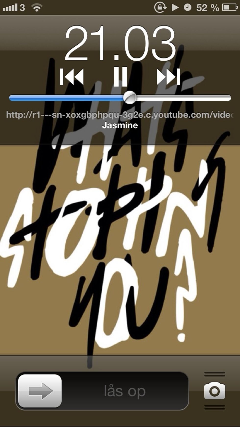Lock your phone and it is still playing. Double click on the home button to pause it.