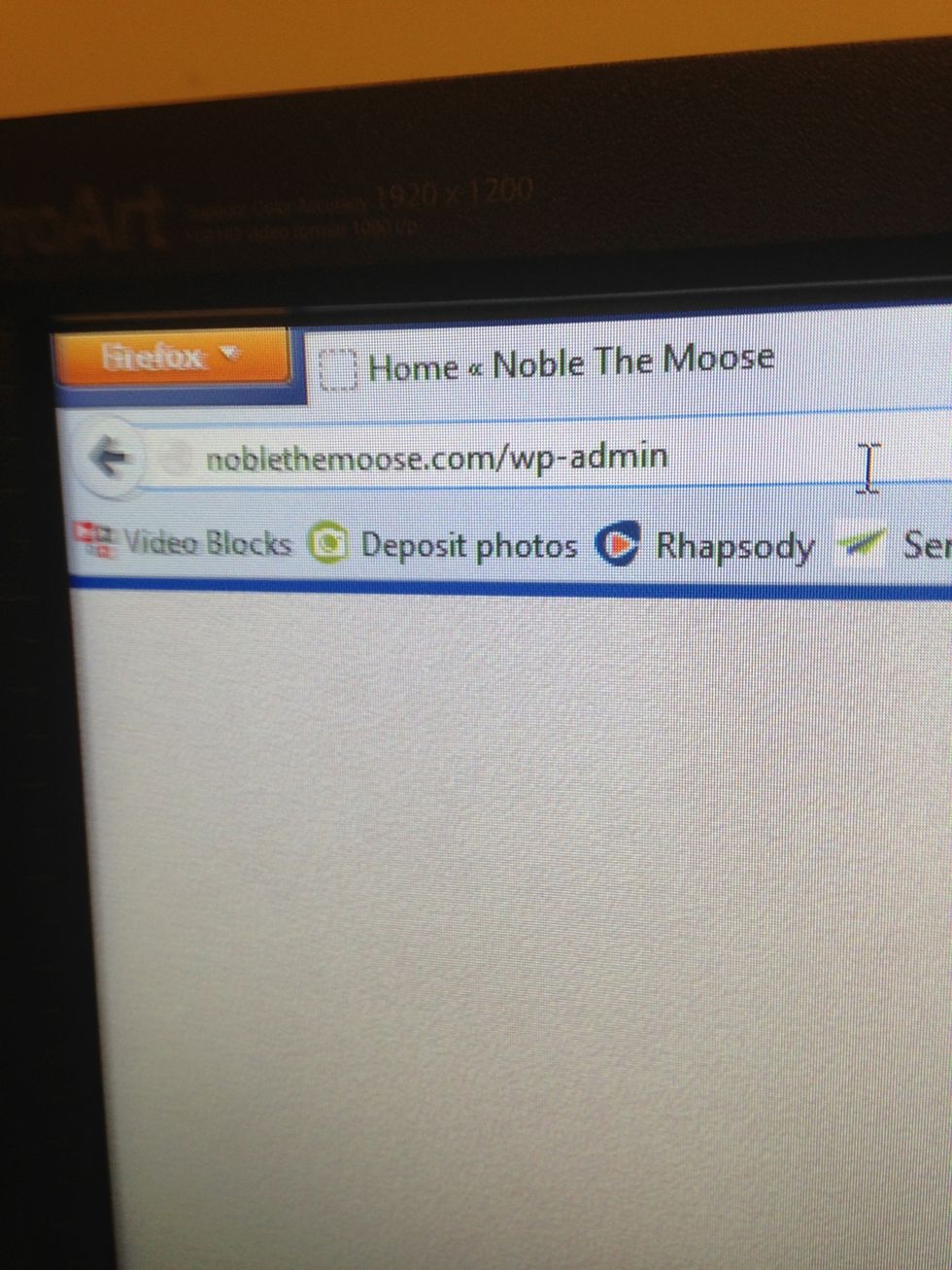 Login to your Wordpress back end by typing in your domain, then a slash, then wp-admin. Hit enter.